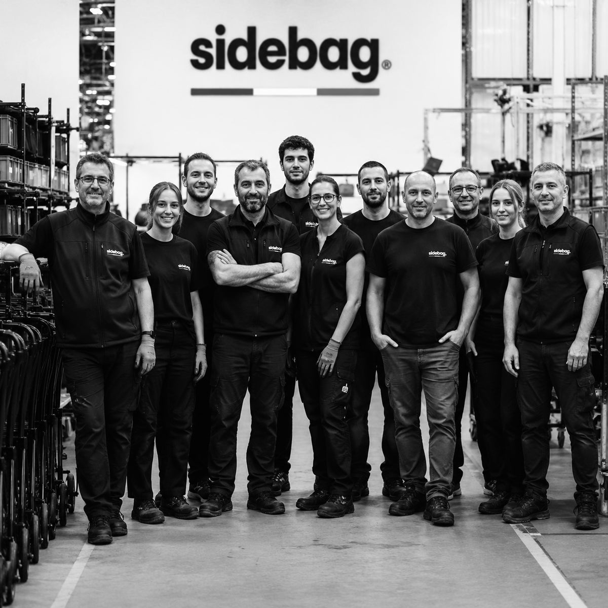 Équipe SIDEBAG dans l'atelier, photo de groupe
